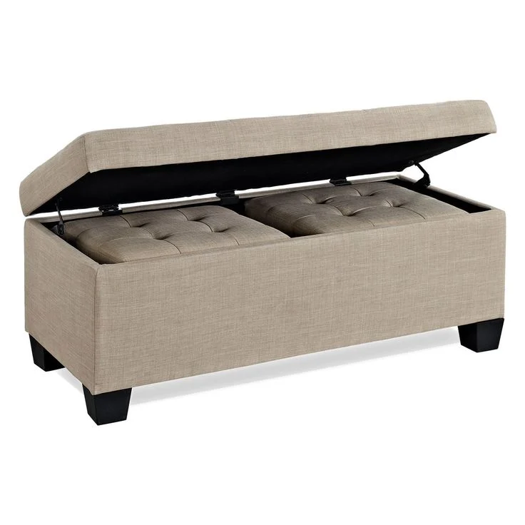 a beige ottoman with two ottomans on it's legs and an open lid in the